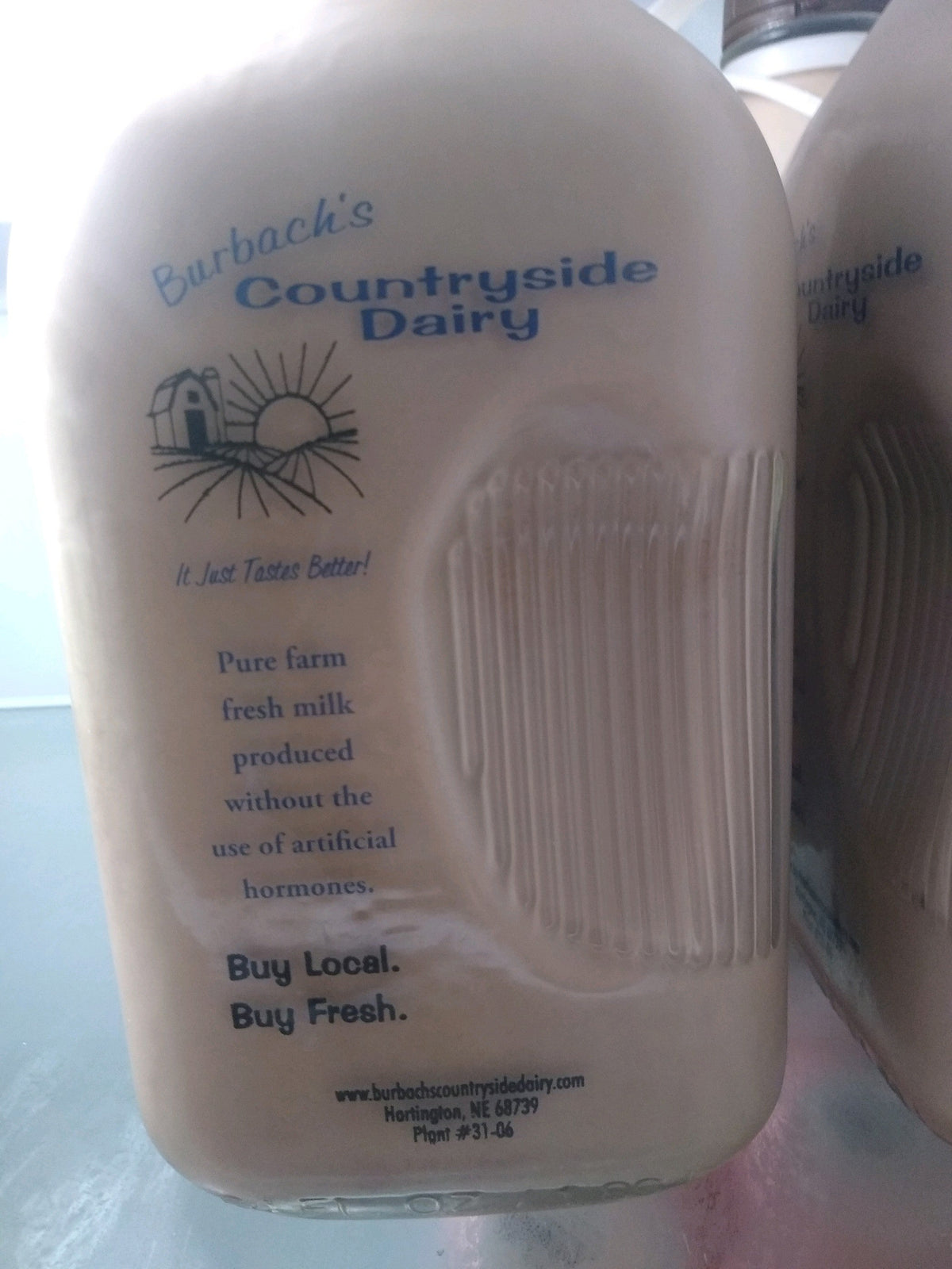 Burbach's Milk **Price includes Bottle Deposit**